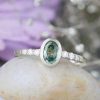 Stones & Gold Rings | Oval Green Sapphire Bezel And Diamond Engagement Ring