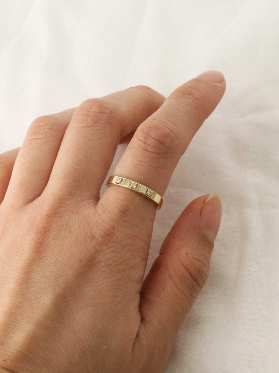 Stones & Gold Rings | Three Stone Diamond Band